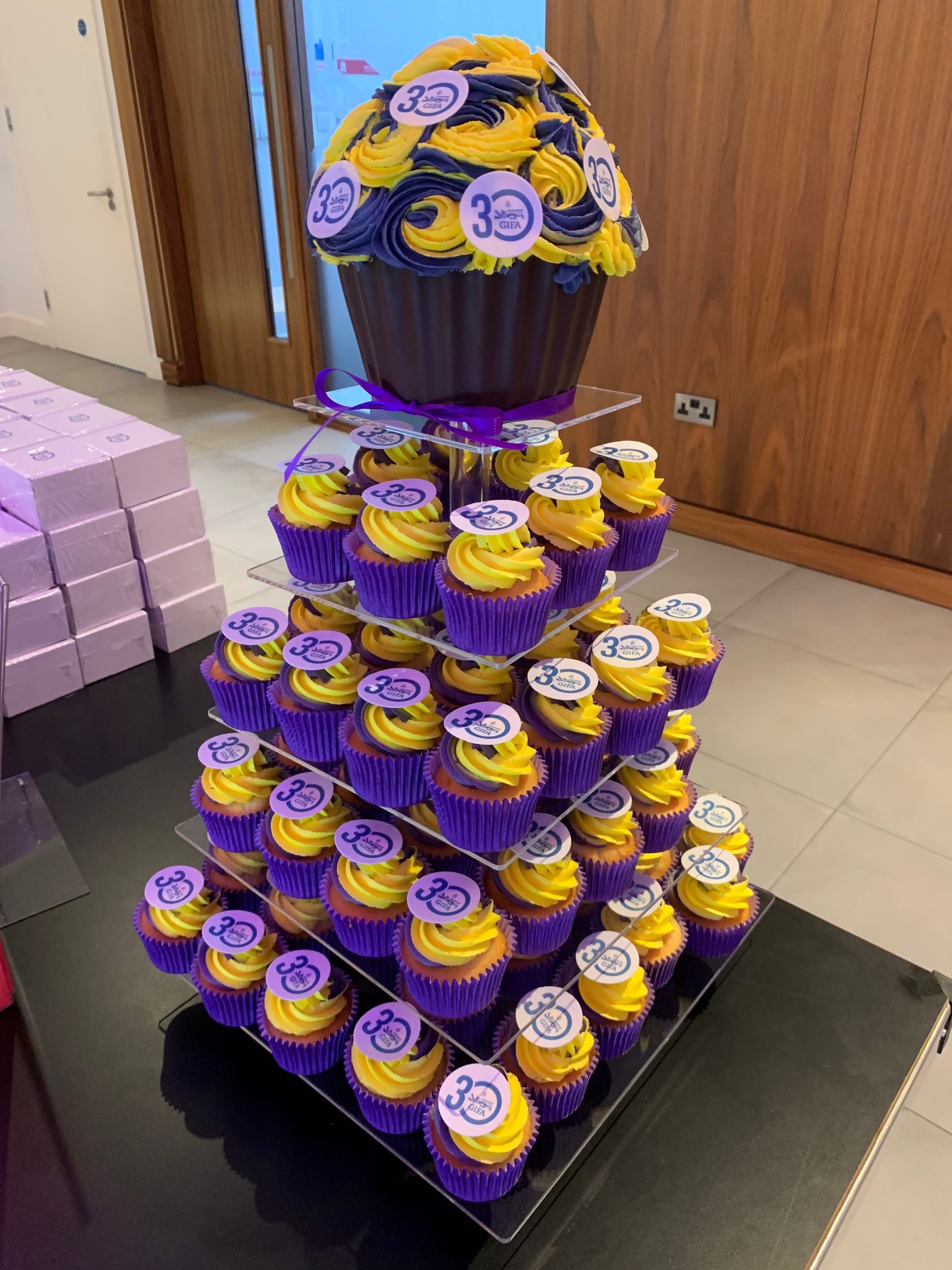 Corporate cupcake stand setup for a large event