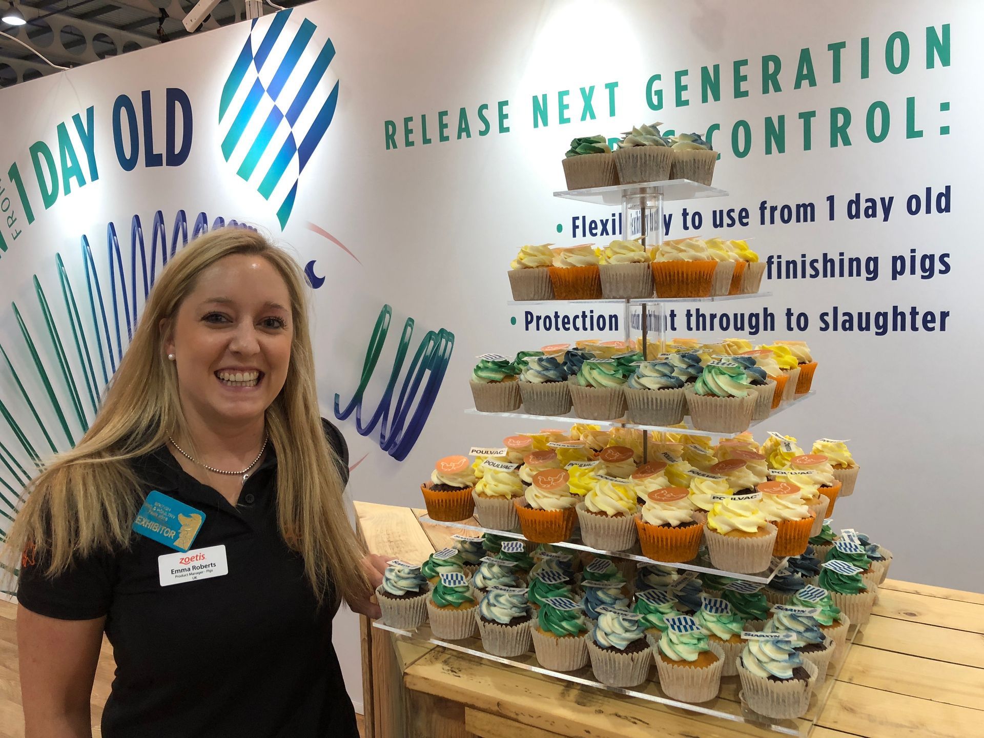 Branded cupcake tower display at corporate function