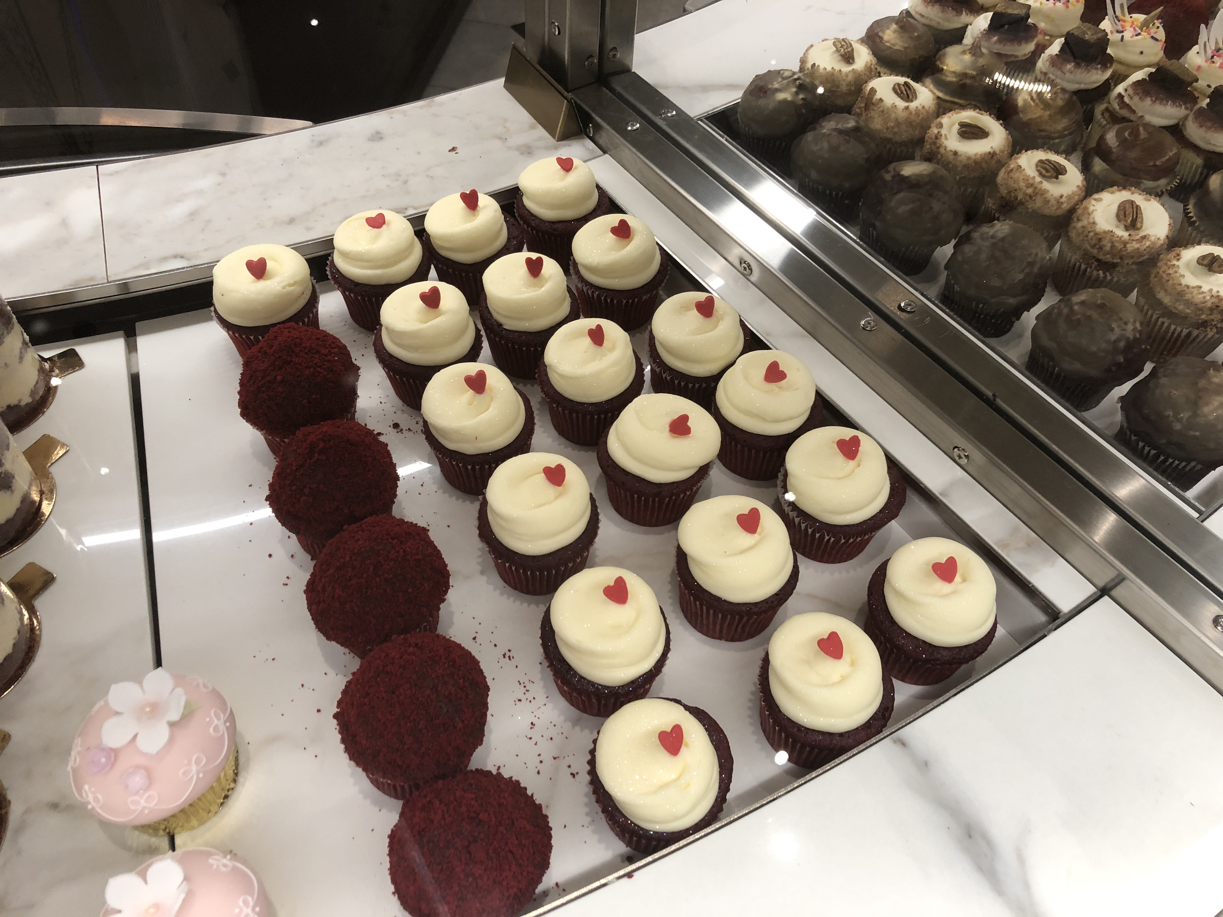 Freshly baked branded cupcakes ready for delivery