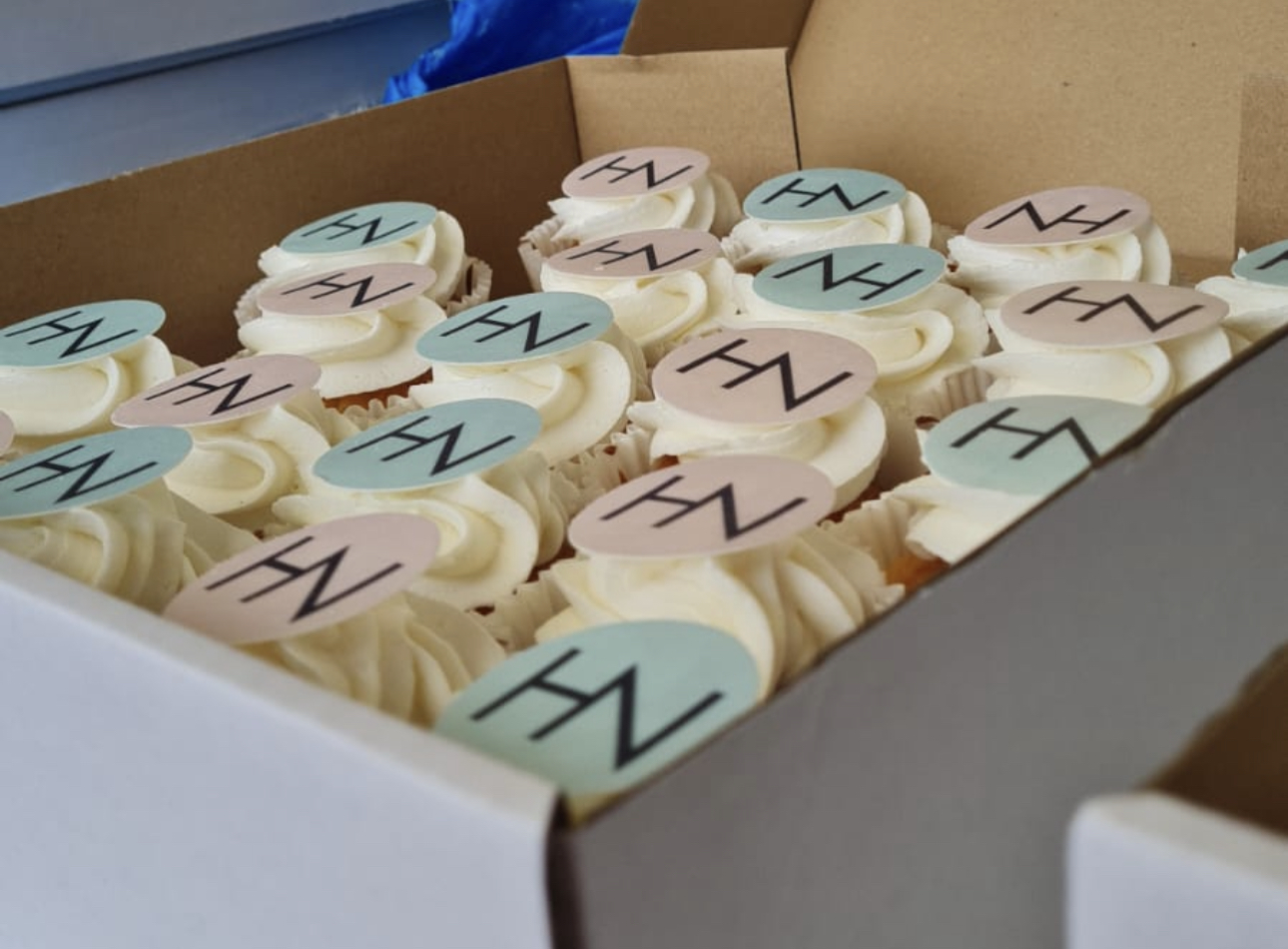 Custom cupcakes with branded edible toppers